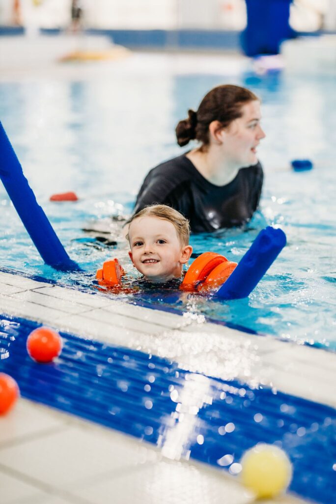 child in swimming pool