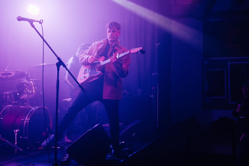 Rafter playing guitar