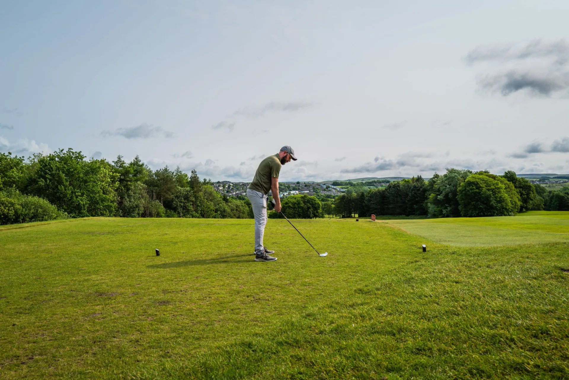 Man playing golf at Townley Golf Club