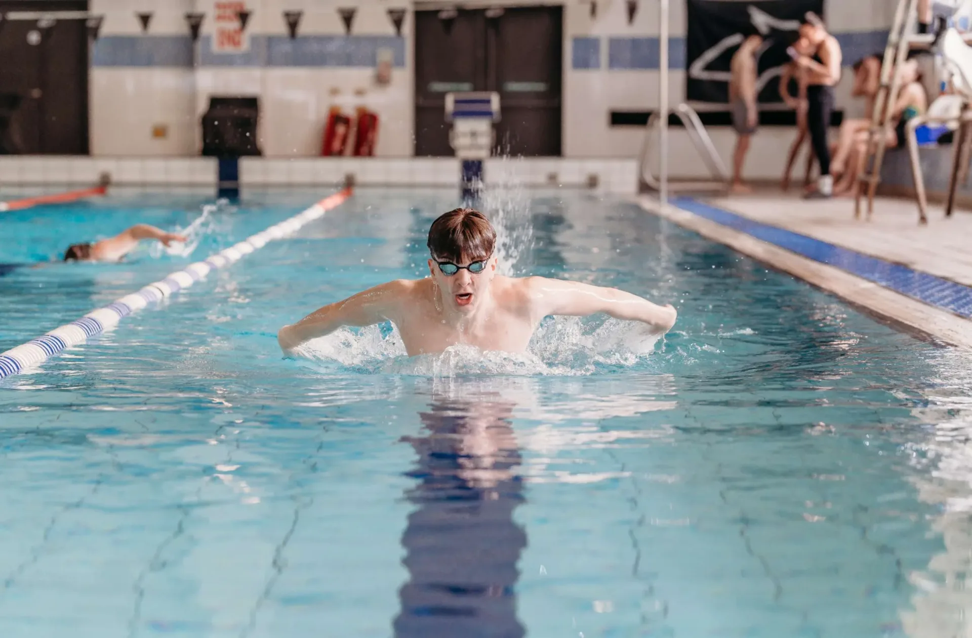 Teenager swimming breatstroke