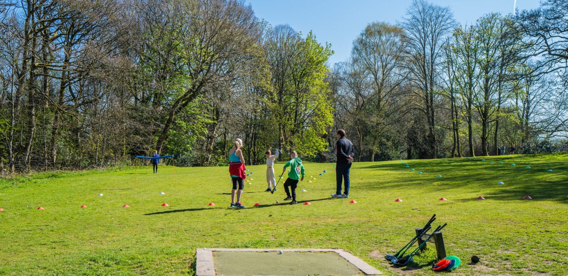 Family playing pitch & putt