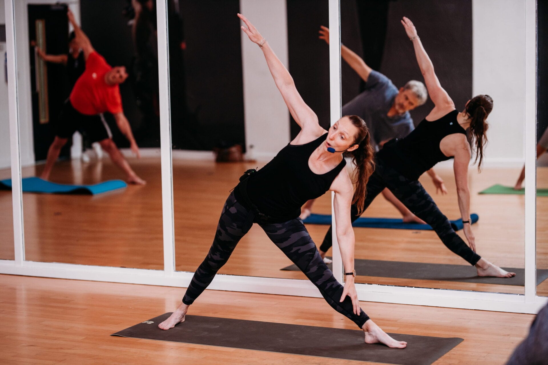 Gym instructor taking a fitness class