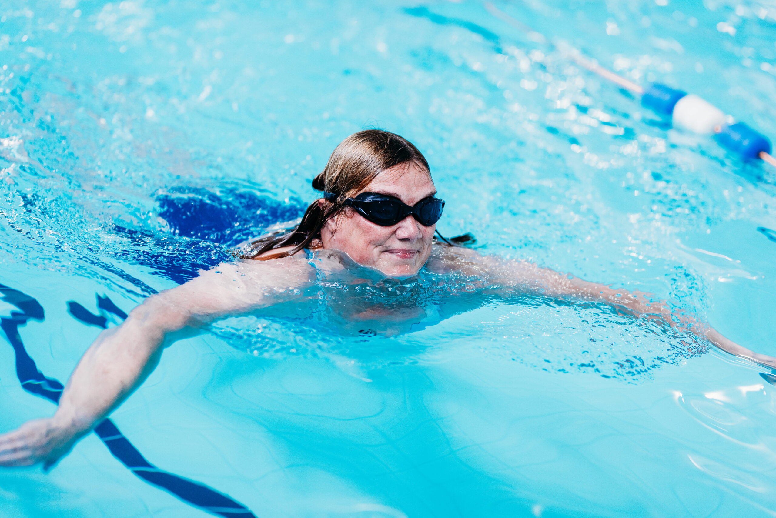 Girl swimming breast stoke