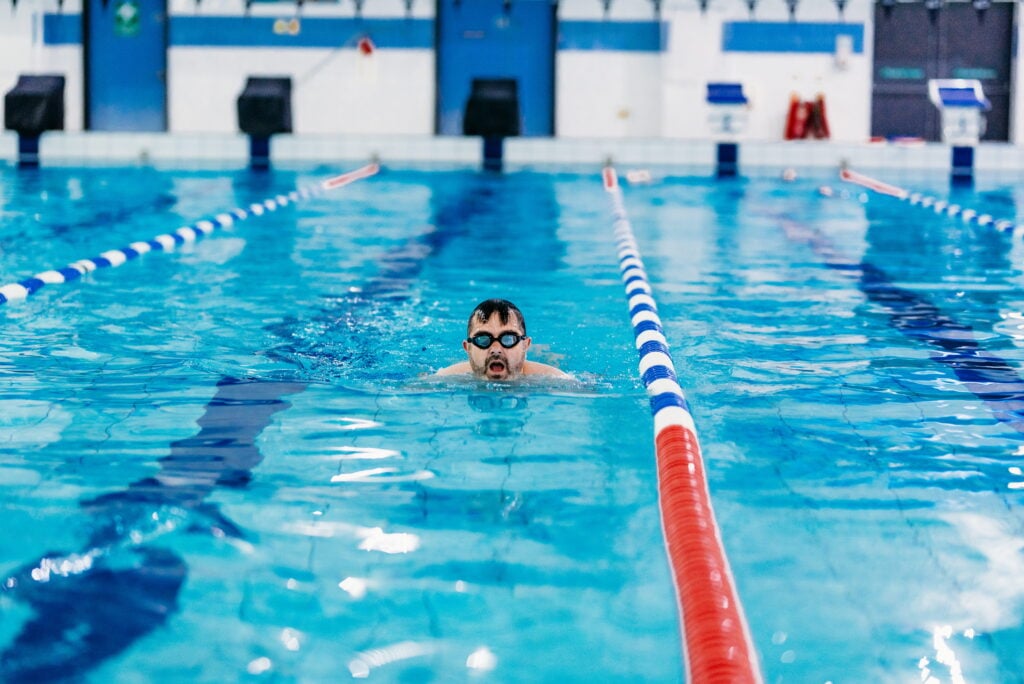 Man taking part in lane swimming