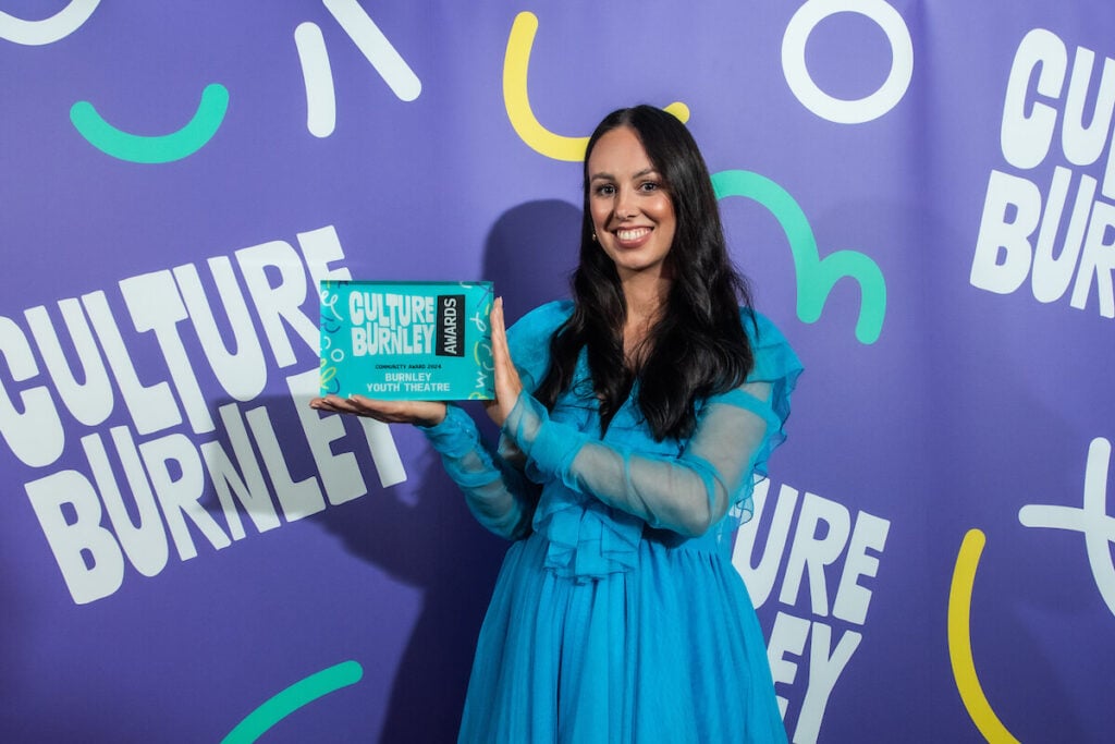 Lady receiving an award