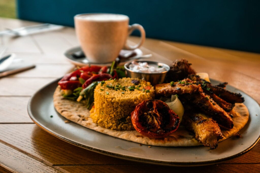 Couccous server with fresh veggies - Prairie Bistro
