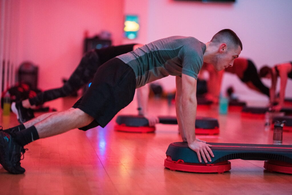Man balancing in the gym class