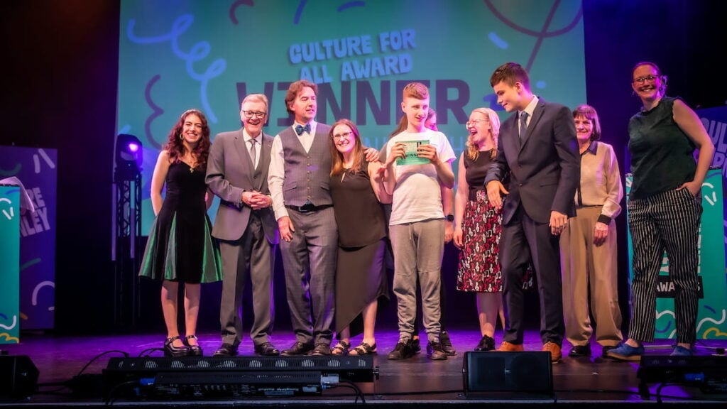 Culture for All Award winner on stage