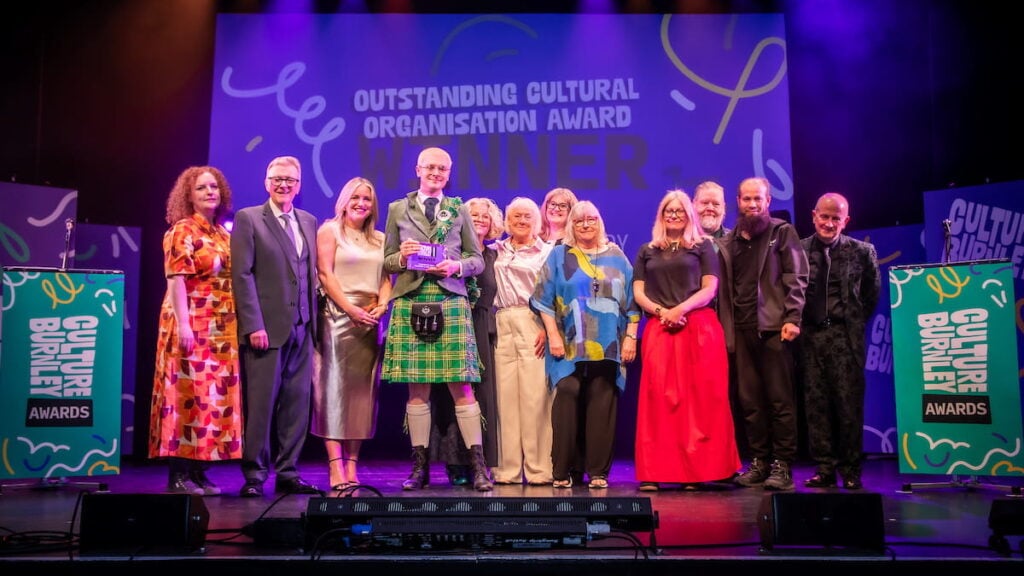 Outstanding Cultural Organisation Award winners on stage