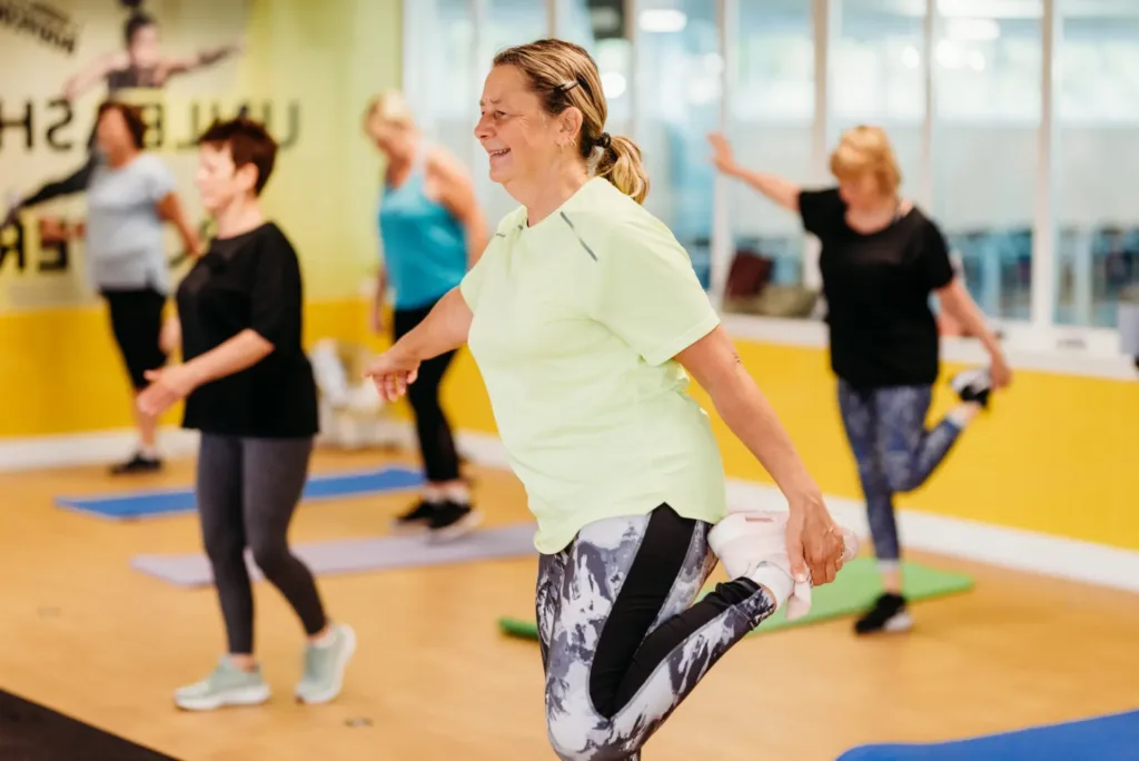 Woman doing leg stretch exercises