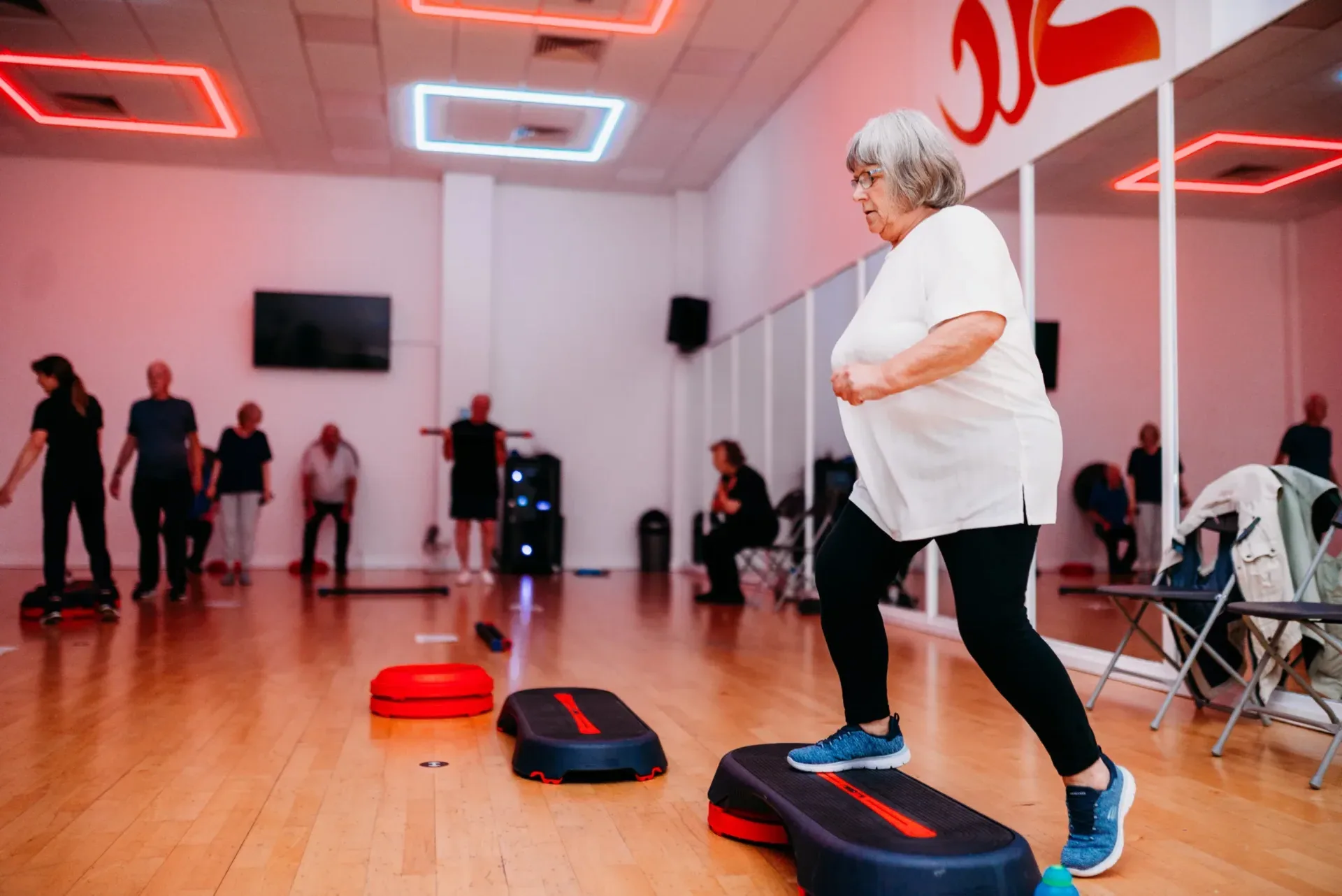 Woman taking part in a step class