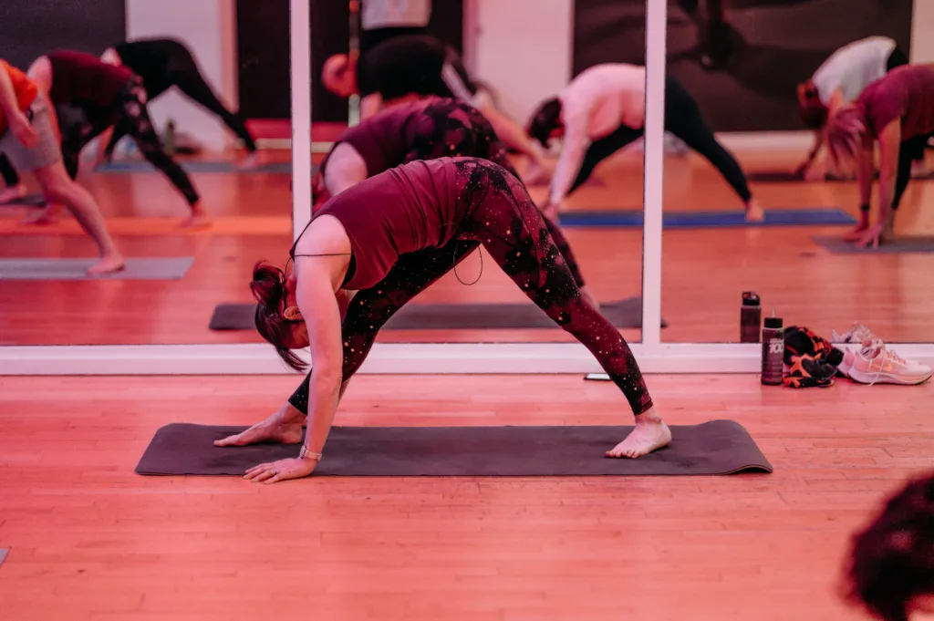 People stretching in a gym class