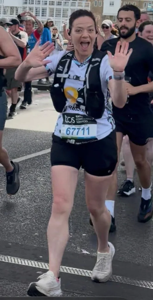 Woman running London Marathon